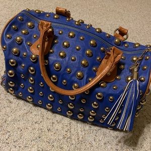 Beautiful gold studded blue bag with tan handles
